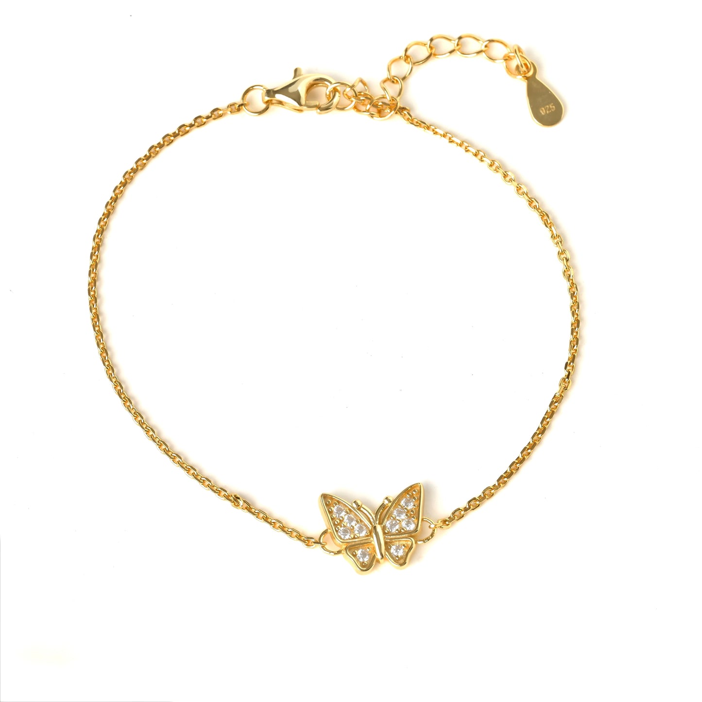 Gold bracelet with a intricate butterfly charm with clear cz stones and an S925 tag on a white background
