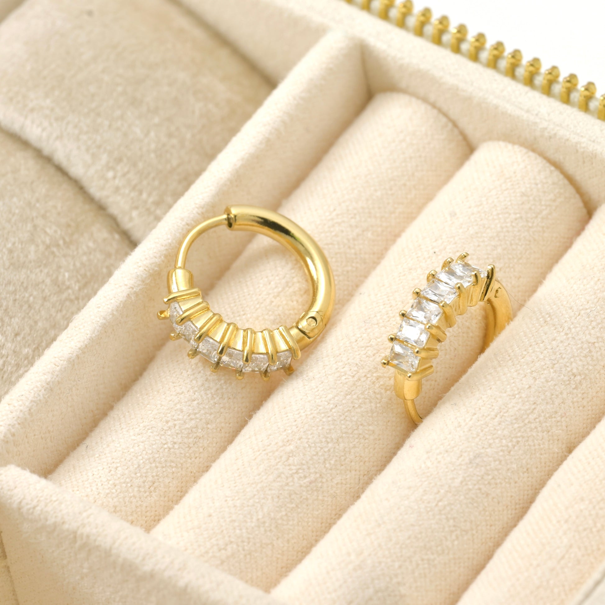 beige jewelry ox view of gold hoops