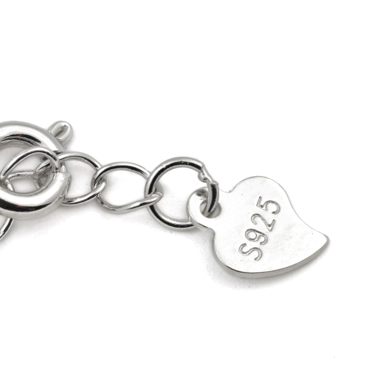 Close-up view of Silver necklace with a heart-shaped tag featuring  'S925' on a white background