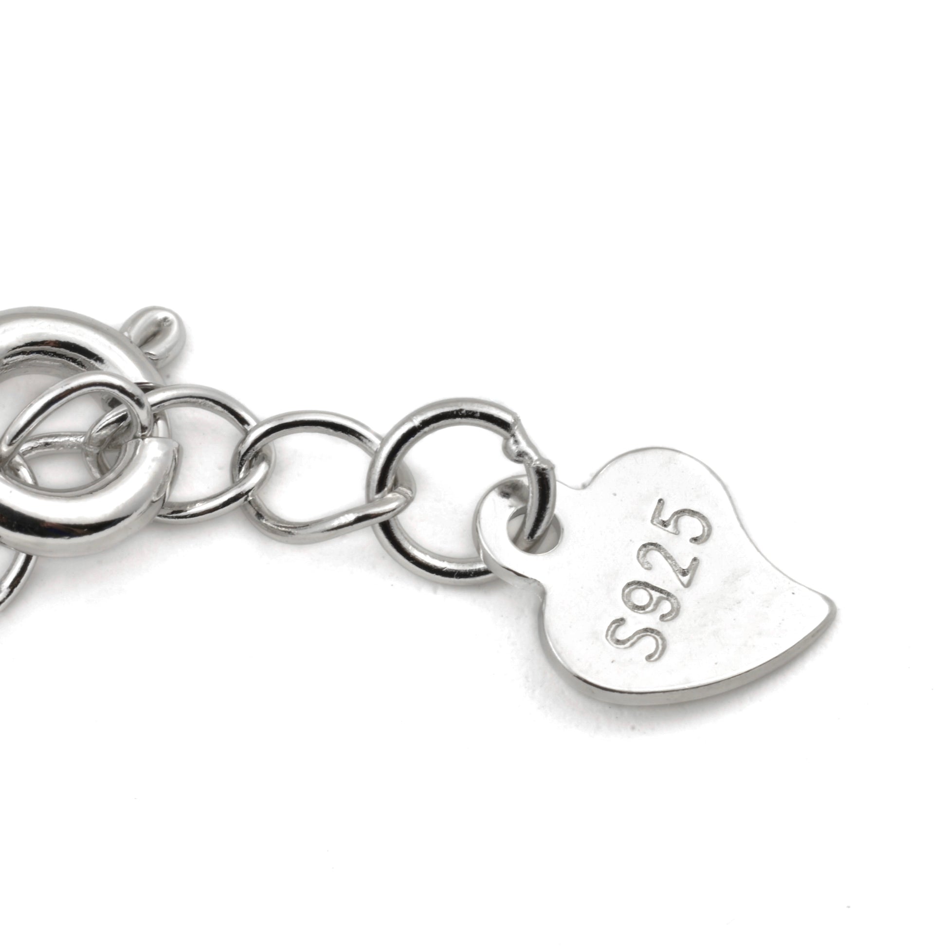 Close-up view of Silver necklace with a heart-shaped tag featuring  'S925' on a white background
