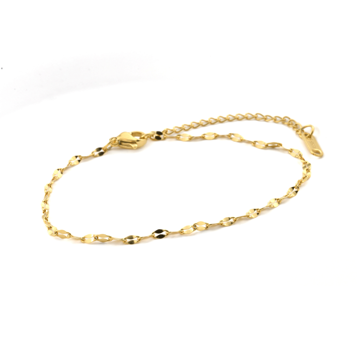 Gold mirror chain anklet on a white background