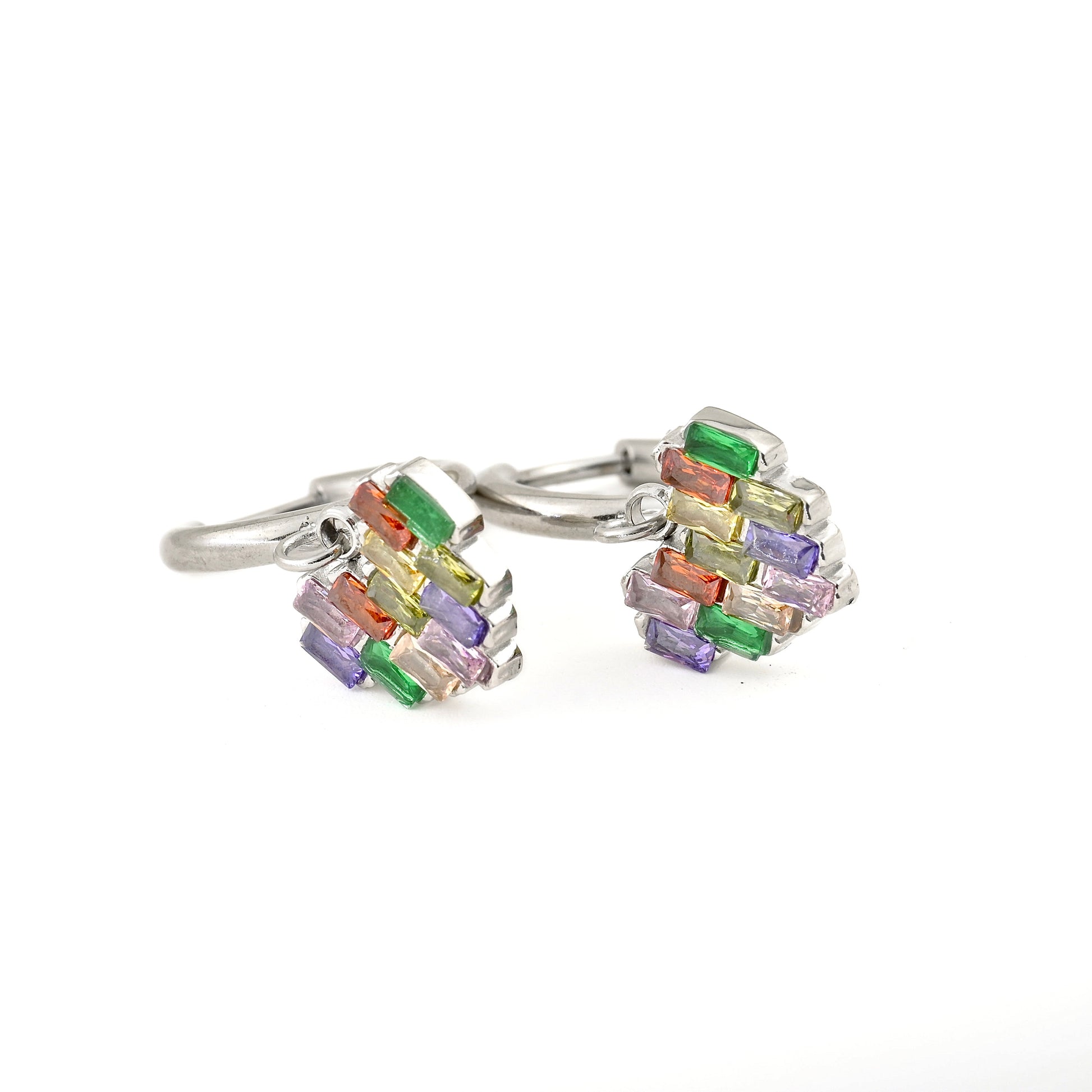 Silver heart hoop earrings with colorful rhinestones on a white background