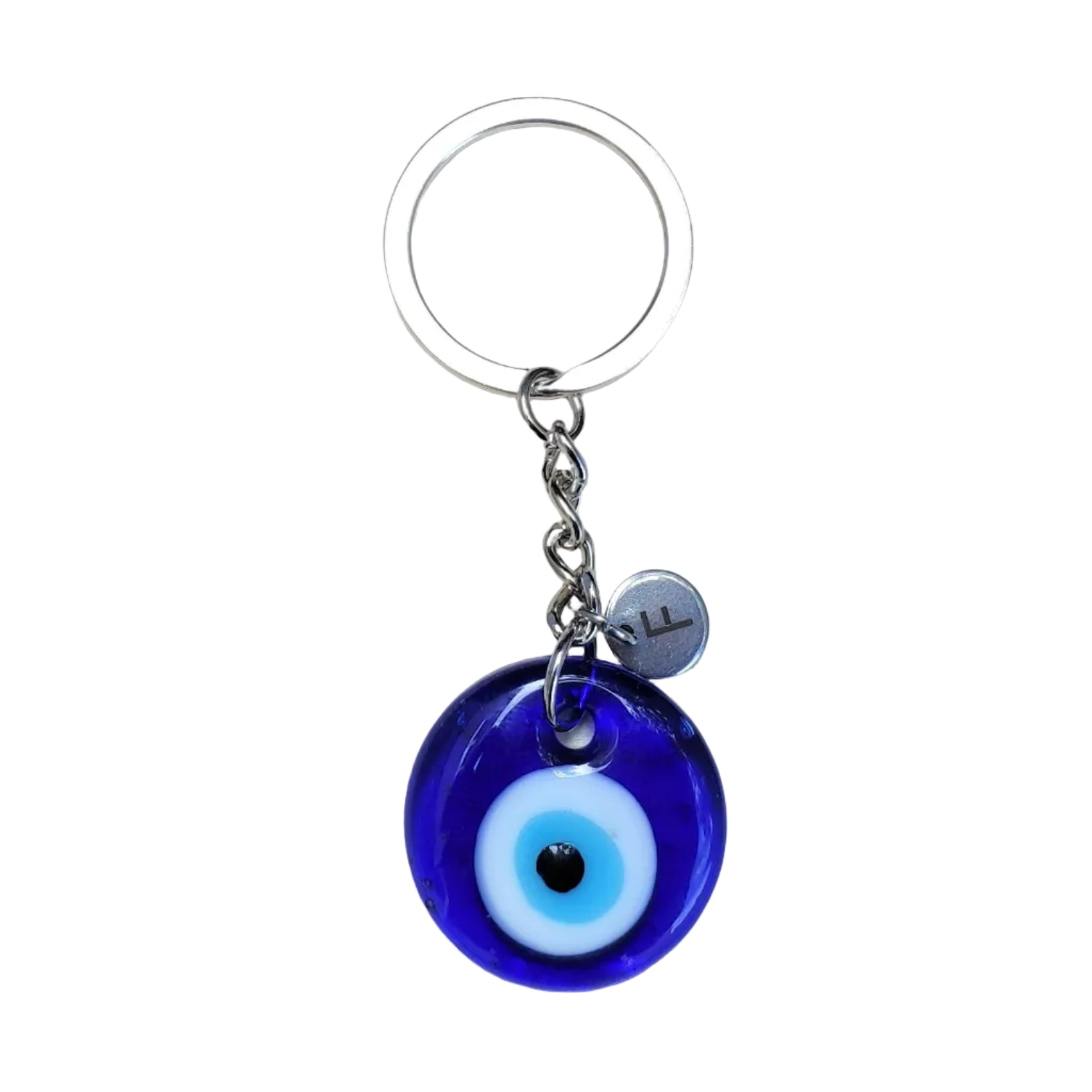 Blue evil eye keychain with a silver ring  and a silver initial disc attached, on a white background