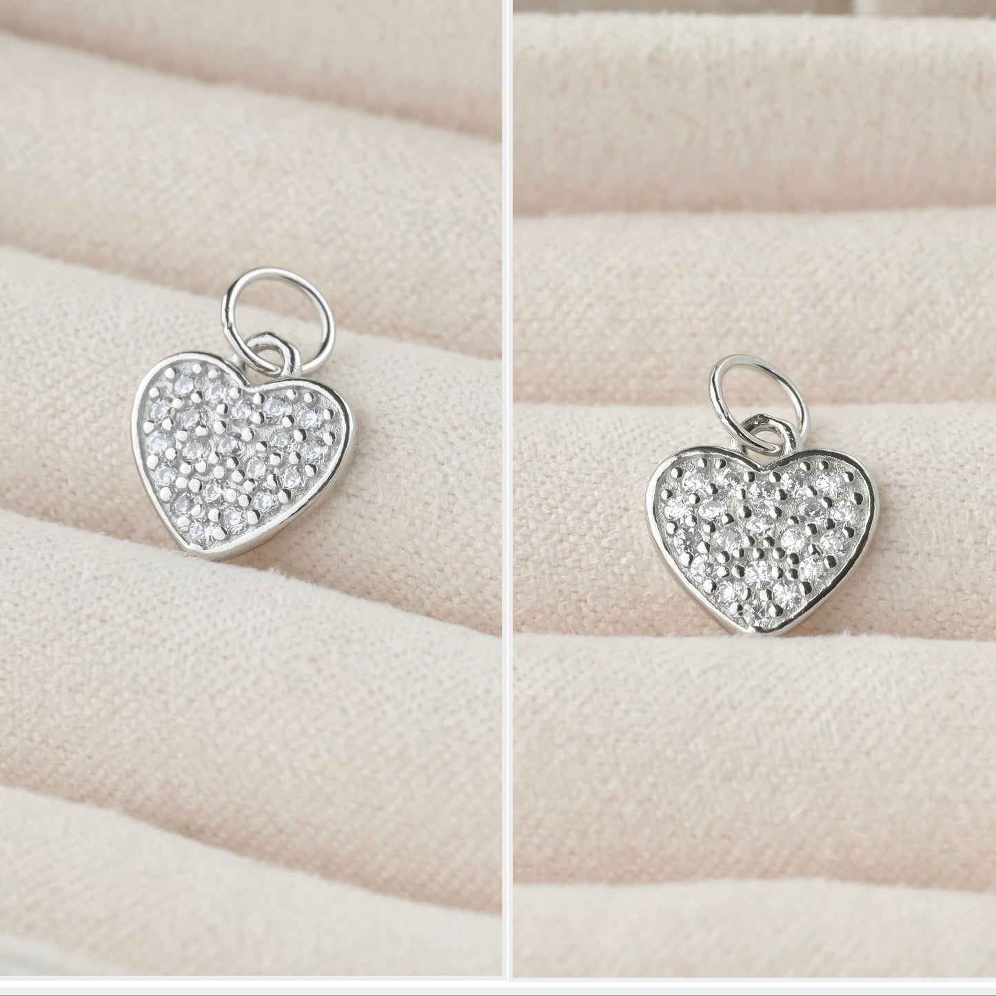 Silver pave CZ heart pendant with clear stones on a beige fabric background