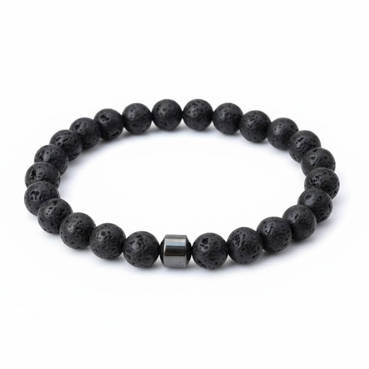 Black lava bracelet with a metal bead on a white background