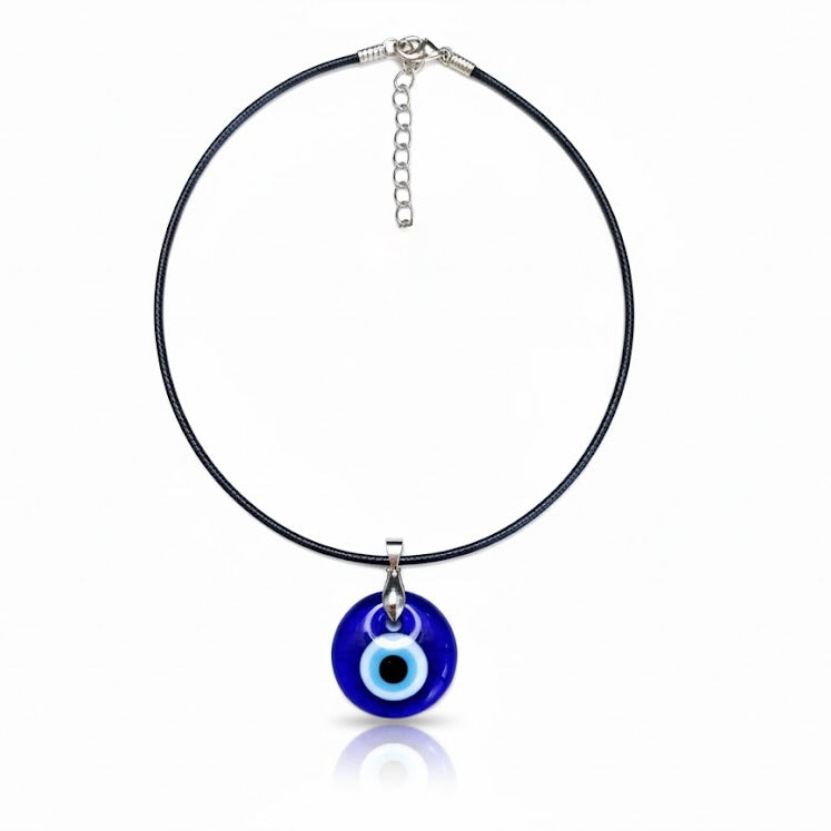 Necklace with a round blue evil eye pendant on a white background